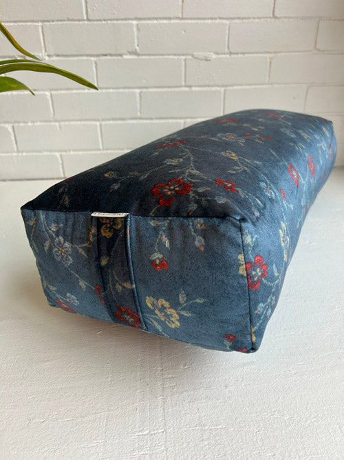 Blue Velvet bolster on white background