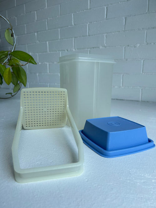 Blue top clear base Tupperware celery elevator