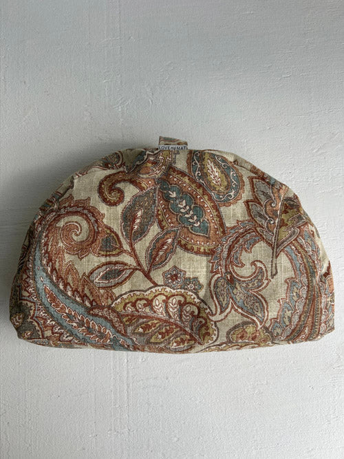 Meditation floor Cushion with paisley pattern on a plain background