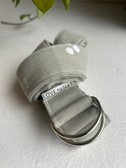 Gray sandal with 'LOVE my MATA' tag on a light background