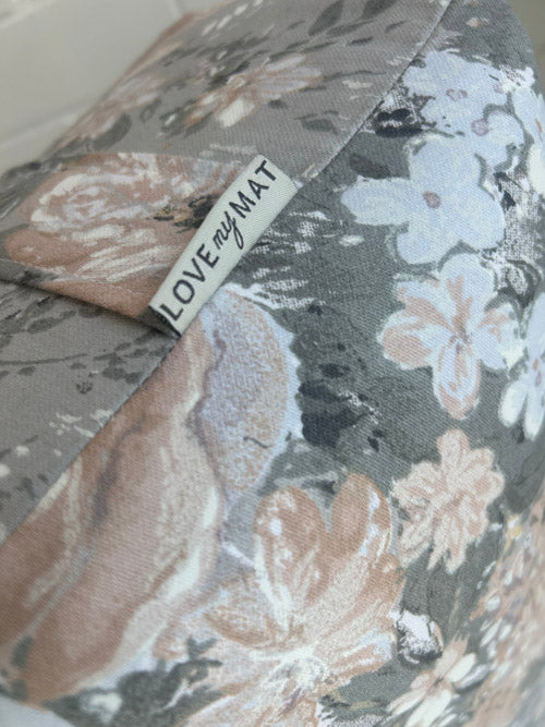 Floral-patterned yoga bolster with 'LOVE my MAT' label