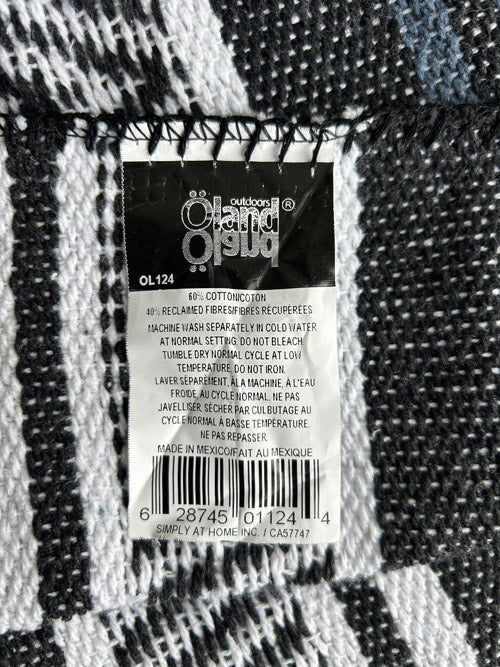 Clothing label on a textured fabric background