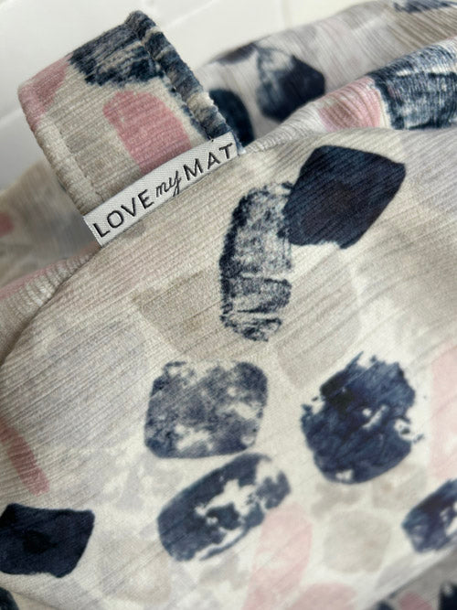 Meditation Cushion product with 'LOVE my MAT' label on a textured surface