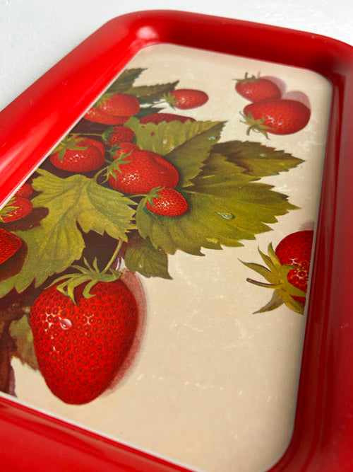 Rectangular tin tray with strawberry design on a white background